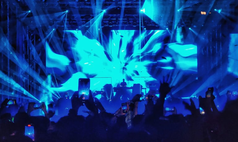 Dynamic shot of a DJ performing live house mucis in Mallorca