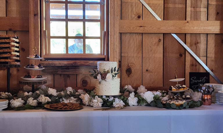 a table with a cake and a knife on it