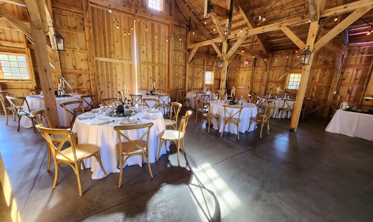 a large room with tables and chairs and a table