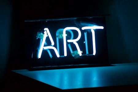 Image of an ART neon sign represents the content of this page as artistic digital works are displaye