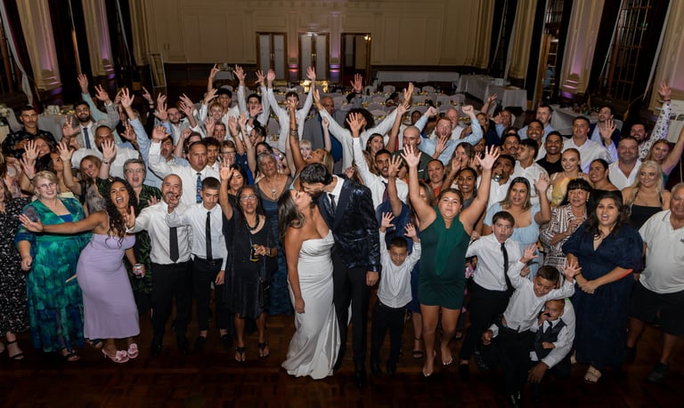 Group photos of all wedding guests, celebrating couple, bride and groom kissing, canberra wedding