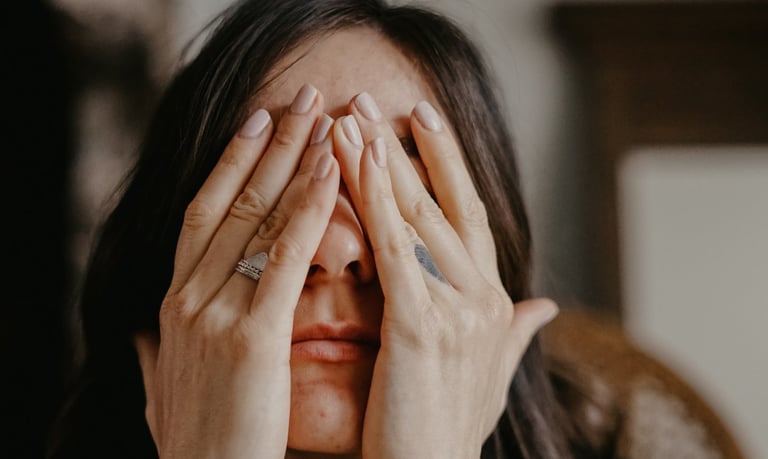 a woman with tattoos on her hands and tatto self doubtos on her hands