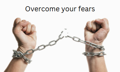 A man breaking chain, a symbol of overcoming fear and moving towards empowerment.