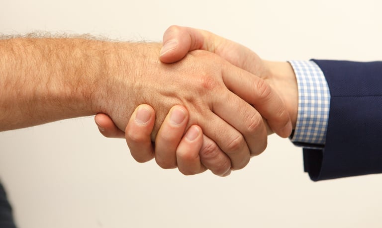 two men shaking hands