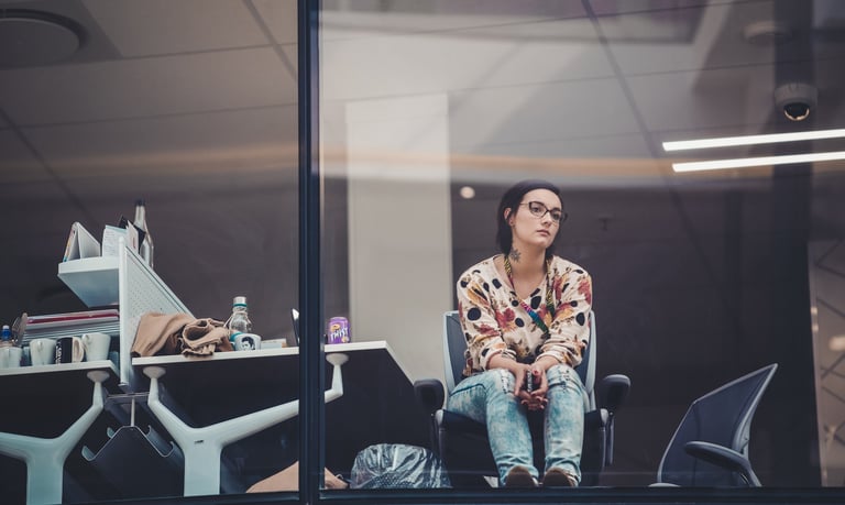 person feeling insecure in office space