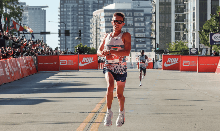 Conner Mantz of the USA at finish line of the 2025 Chicago Marathon, celebrating after breaking the 23-year record