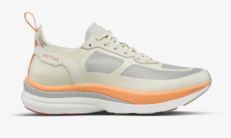 Hetta Alma Tempo women’s running shoe in white, showcasing breathable TPU mesh upper, reflective accents, cushioned midsoLE 