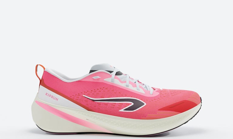 KIPRUN Cushion 500 in bubblegum pink, showing breathable jacquard mesh upper, cushioned heel, and durable anti-slip rubber ou