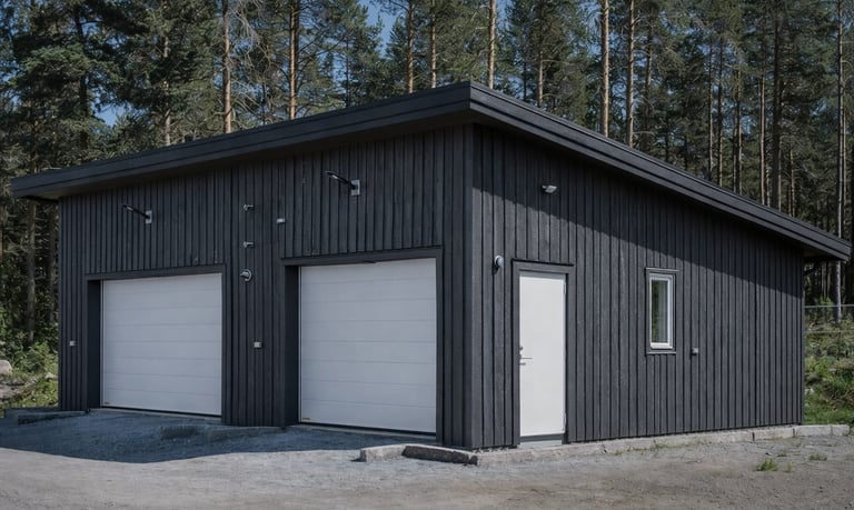 A garage painted in grey with heritage barn paint