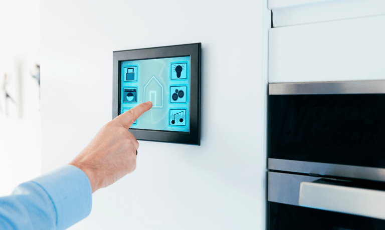 a person pointing at a wall mounted on a wall