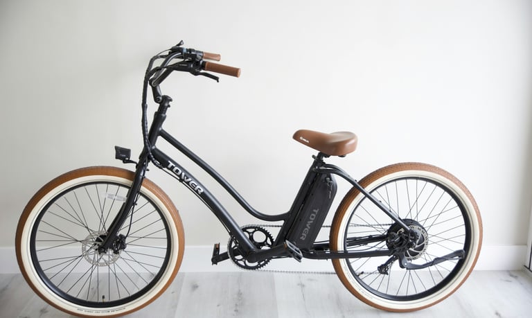 E-bike charging in a hallway, highlighting fire safety risks for UK renters