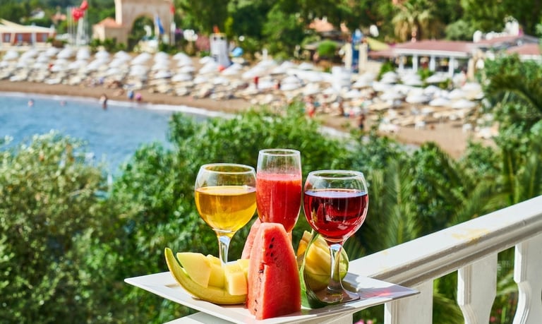 Healthy food travel destinations - a tray with fruit and wine glasses on a balcony