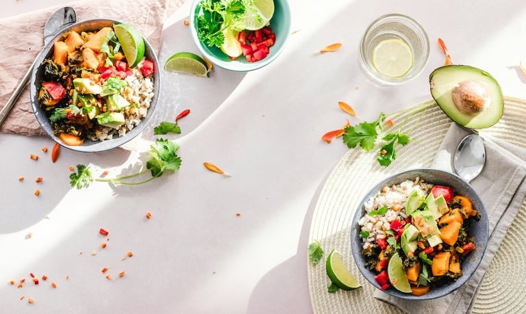 Longevity diet - a table with bowls of food and a glass of water
