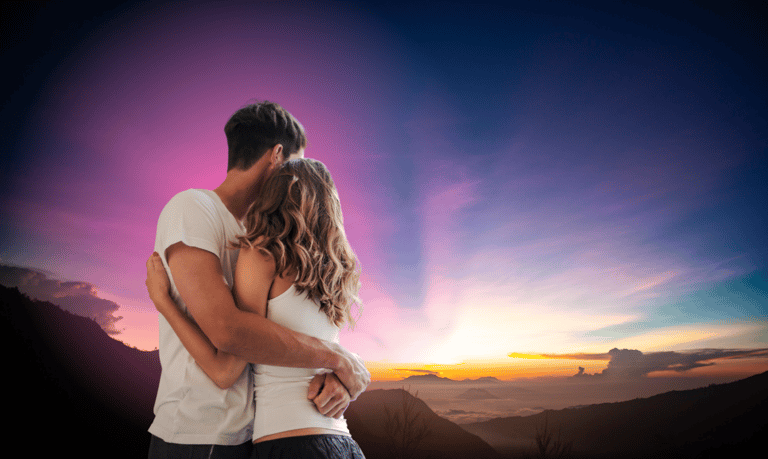 a man and woman embracing in the sunraising