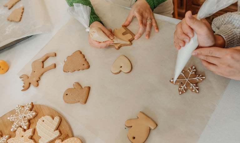 Women decorating holiday cookies