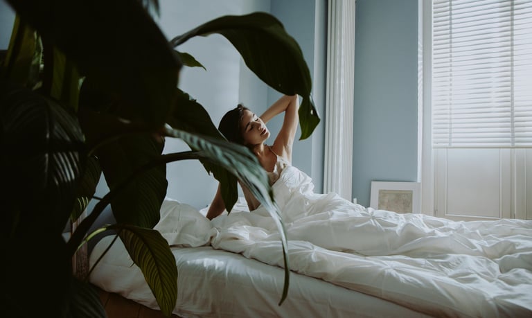 An Asian woman waking up