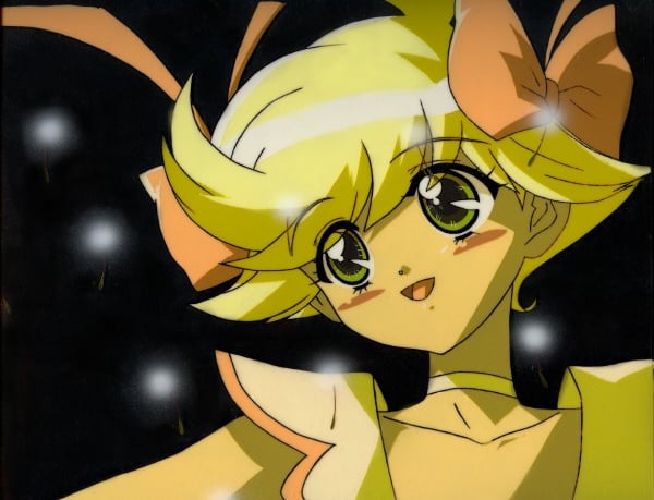 a woman with blonde hair and a yellow dress