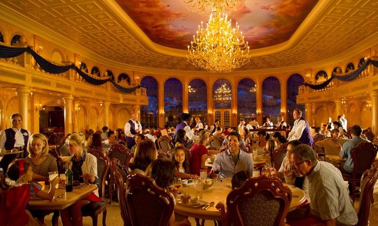 a restaurant with a chandelier
