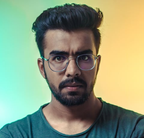 suspicious man with glasses and beard 