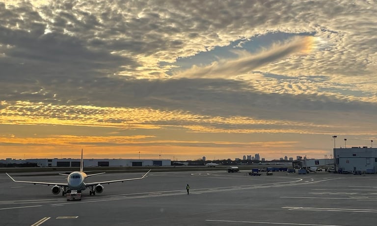 a plane is parked on the tarmac
