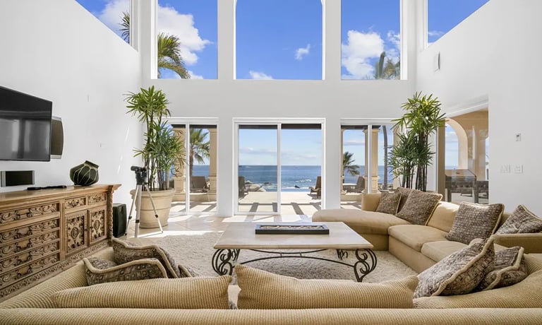 Spacious living room with a spectacular oceanfront view in a luxury villa in Santa Carmela, Cabo.