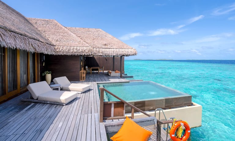 Ayada Maldives sunset ocean suite with pool outdoor