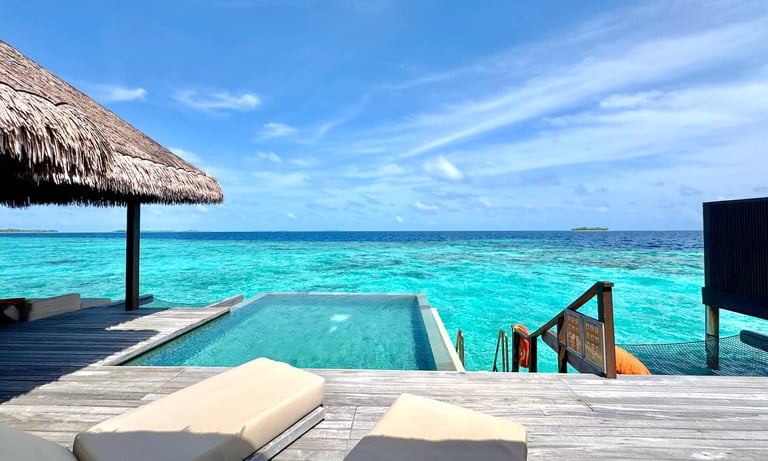 Ayada Maldives sunset ocean suite with pool outdoor