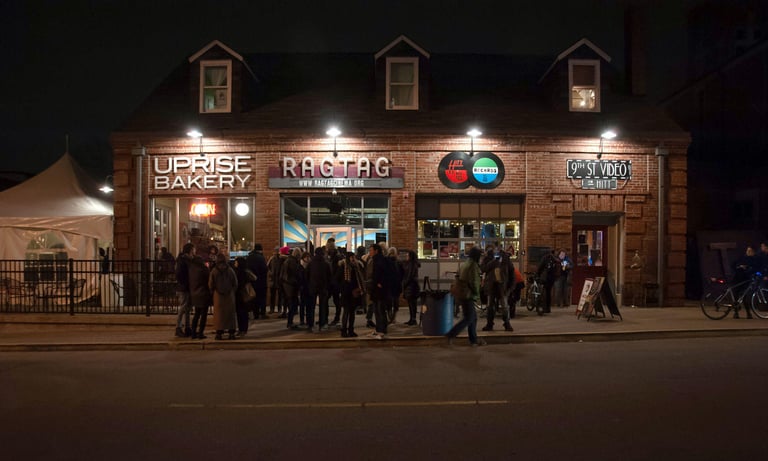 Outside of Ragtag Cinema with a crowd of people gathered 
