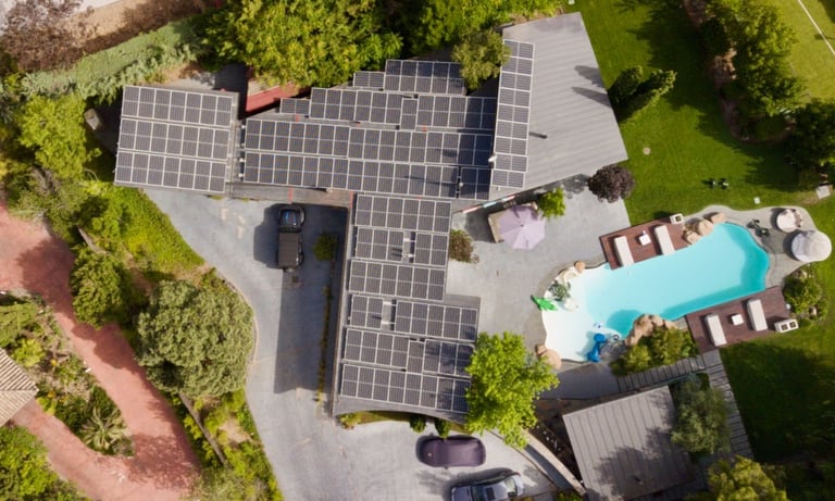 a house with solar panels installed on a roof