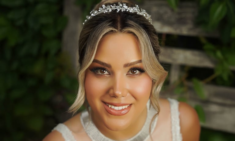 Close-up bridal portrait with natural makeup and tiara, captured by Fred Art Studio