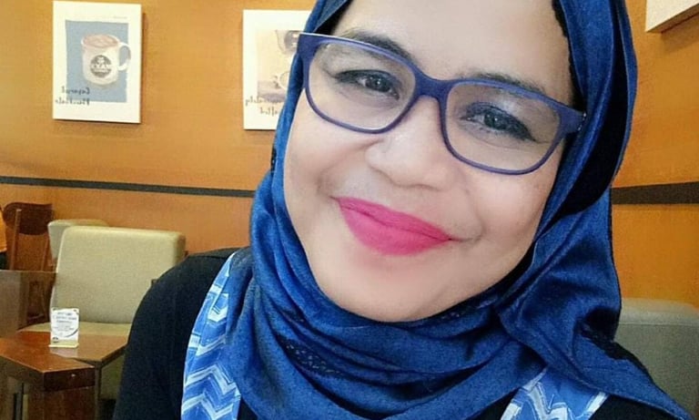 Woman in Blue Hijab