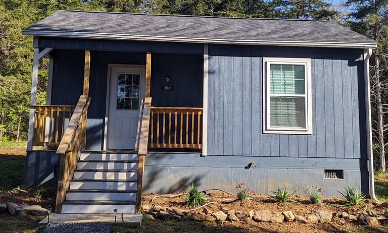 airbnb cabin rental blue cottage