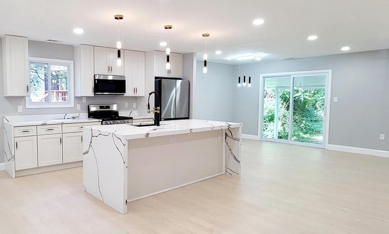 Luxury kitchen renovation in Woodbridge, VA with high‑end cabinetry, quartz surfaces, premium applia