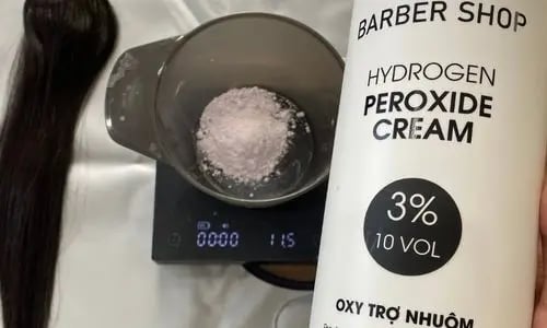 Vietnamese Raw hair bundle next to the 3% developer and bleach