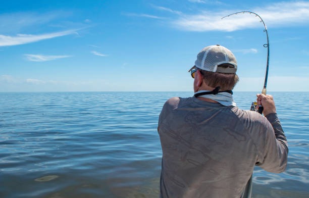 man catching a fish in Florida