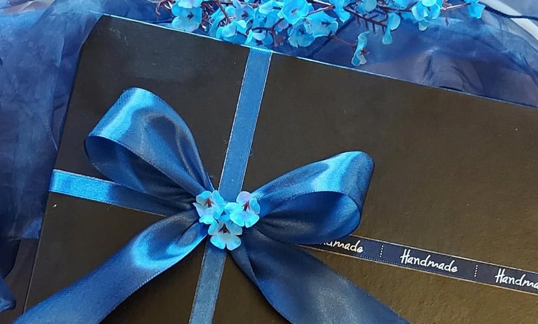 Beautifully packed black and blue box for Ericsson Pakistan. Hand-painted pen holders corporate gifts