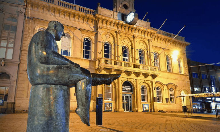 The Sock Man statue, Loughborough Market Place – hosiery heritage memorial