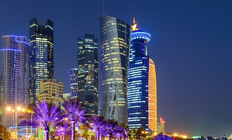 a cityscape of a city at night