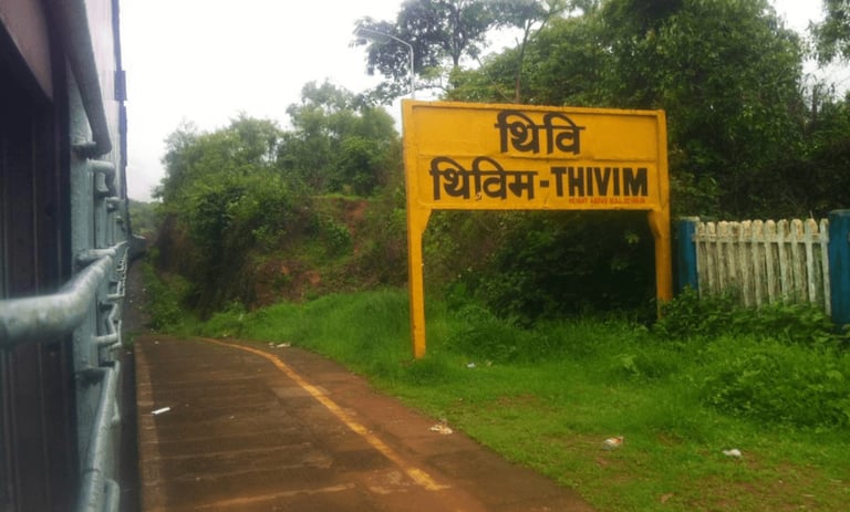 a sign board that says Thivim
