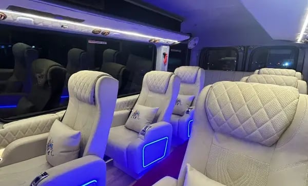 Urbania luxury tempo traveller interior for rent in Delhi with premium seating and modern design