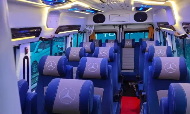 16 seater luxury tempo traveller interior on rent in Delhi ideal for family and group travel
