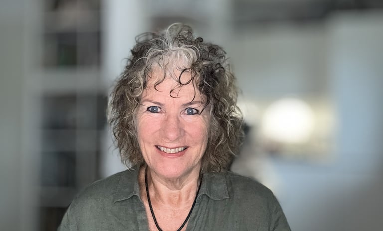 Portrait of German teacher Uschi in a calm indoor setting