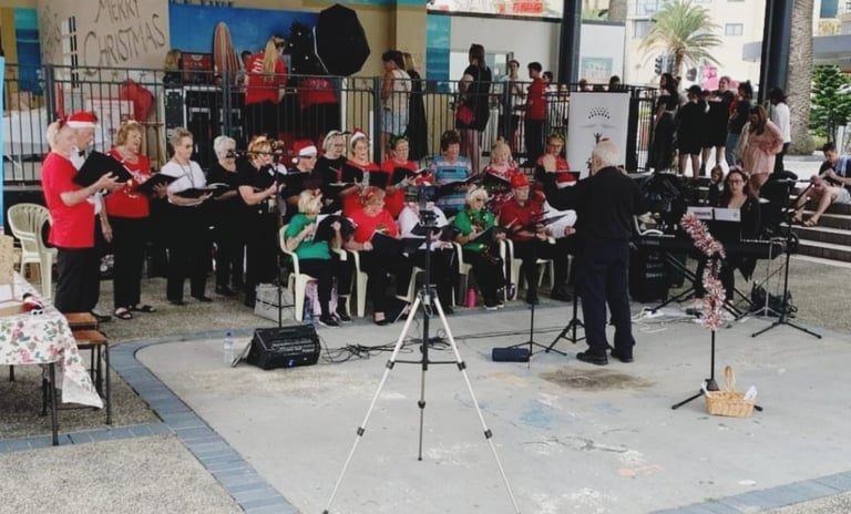 The District Singers perform at Cronulla Mall