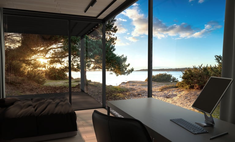 Cozy bedroom inside the Mirrored Cabin with natural morning light