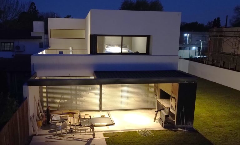 a house with a large patio area and a patio area