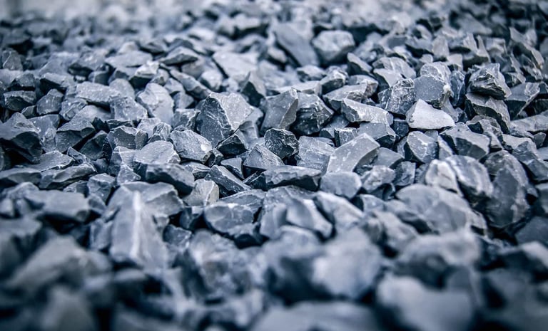 Close-up of pile of gray crushed stone gravel used for landscaping and construction projects.
