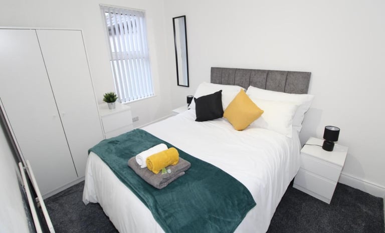 Double bedroom with white walls