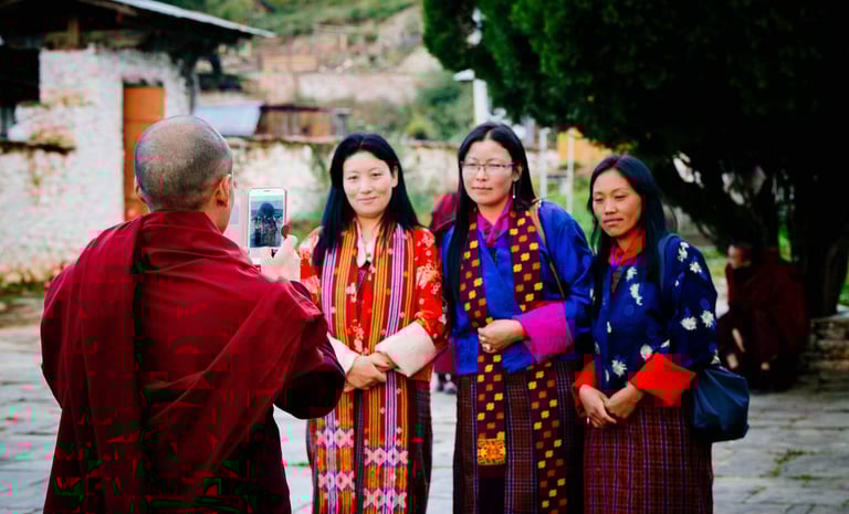 Bhutanese-Women-Getting-Ready-For-A-Quick-Pose-At-Jambay-Lhakhang-Drub-Festival