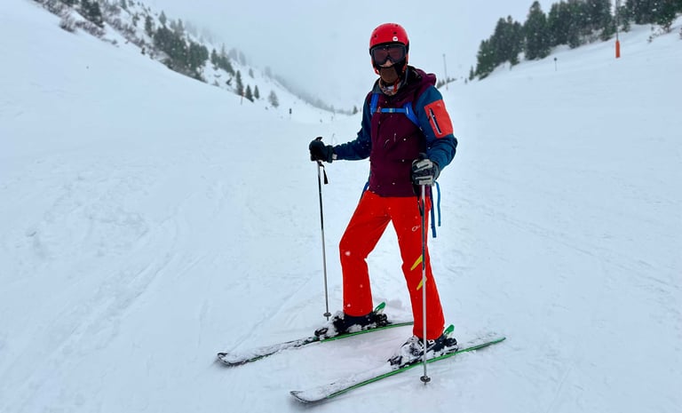 a guy skiing in alps mountains in austria