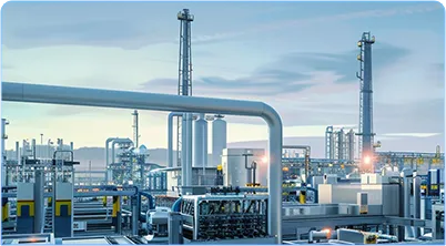 a large industrial steel pipework with a view of a refinery